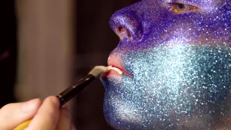 Face-art.-The-make-up-artist-applying-foundation