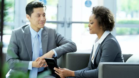 Young-multi-ethnic-finance-team-using-tablet-technology