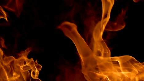 Flames-of-fire-on-black-background-in-slow-motion