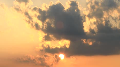 View-of-bright-orange-sky-with-sun-and-rays