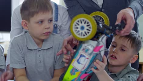 Schoolchildren-Studying-Car-Model