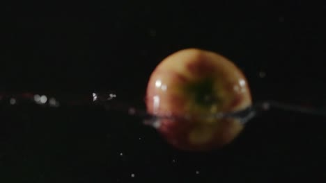 Apple-Falling-Into-Water-Slow-Motion