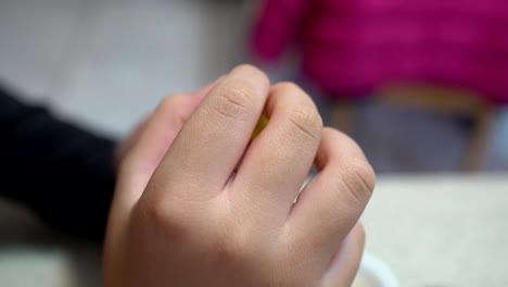 A-child-playing-with-clay.