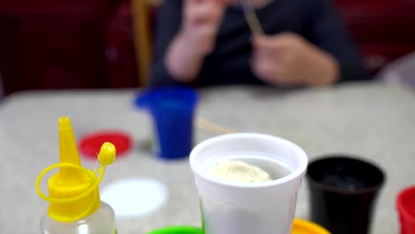 A-child-playing-with-clay.