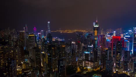 night-illumination-harbor-cityscape-aerial-timelapse-panorama-4k-hong-kong