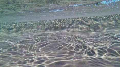 sea-sand-under-water-waves