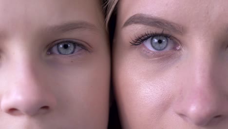 age-comparison,-eyes-of-caucasian-mother-and-daughter-next-to-one-another-looking-together-at-camera