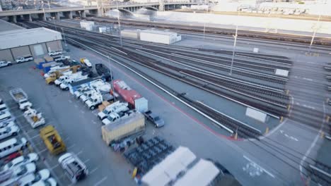 Cool-Aerial-shot-moving-away-from-train-tracks-in-Los-Angeles,-CA