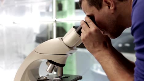 The-doctor-works-with-a-microscope