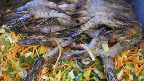 raw-shrimp-with-vegetables-lying-on-the-table