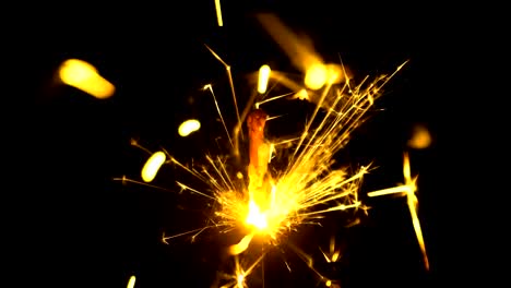 Yellow-Sparklers-is-Sparkling-On-Black-Background-Close-Up