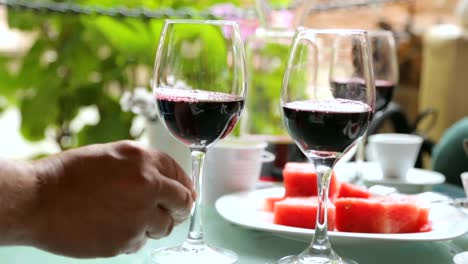 People-drinking-wine-in-street-cafe