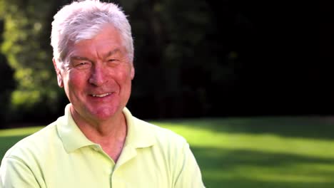 Portrait-of-an-older-male-in-a-park.-Medium-shot.