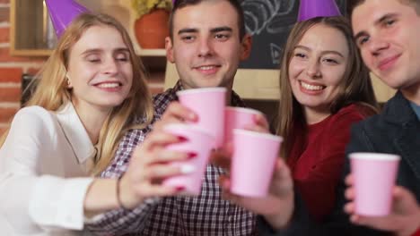 Group-of-joyful-friends-lifting-the-glasses,-concept-of-great-and-amazing-celebration-excitement