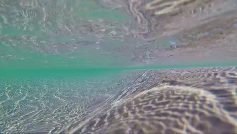 sea-sand-under-water-waves