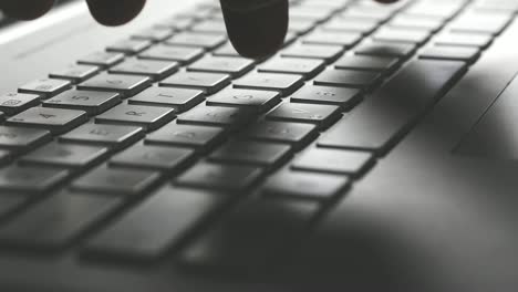 closeup-of-fingers-typing-on-laptop-computer-keyboard