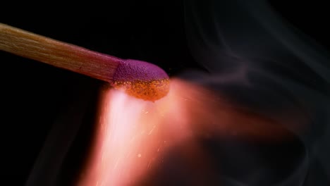 Igniting-Matches-against-Black-background,-Slow-motion-4K