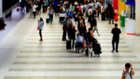 Passengers-in-airport,-motion-blur