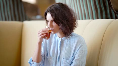 Very-beautiful-woman-is-having-breakfast-at-cafe