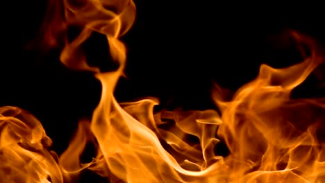 Flames-of-fire-on-black-background-in-slow-motion