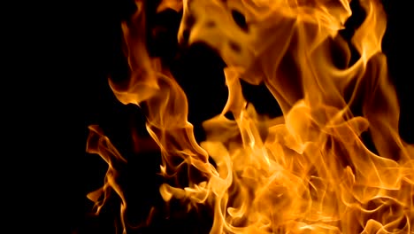 Flames-of-fire-on-black-background-in-slow-motion