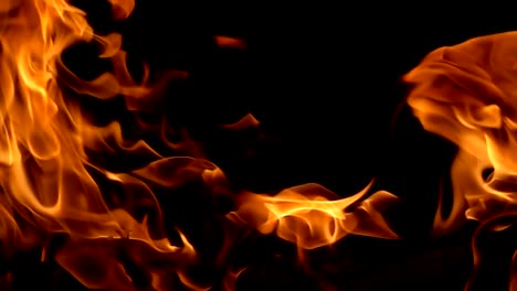 Flames-of-fire-on-black-background-in-slow-motion