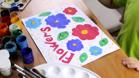 Preschool-girl-paints-flowers