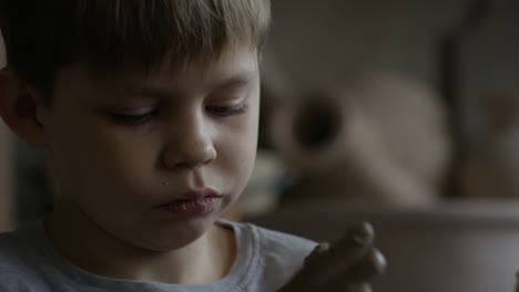 Little-Boy-Sculpting-with-Clay