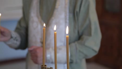 Monk-lighting-candle