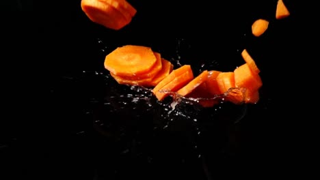 Falling-of-segments-of-carrots.-Slow-motion.