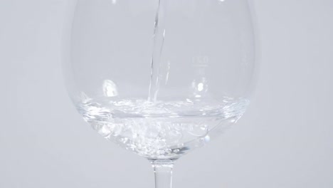 Water-Pouring-Into-Wine-Glass