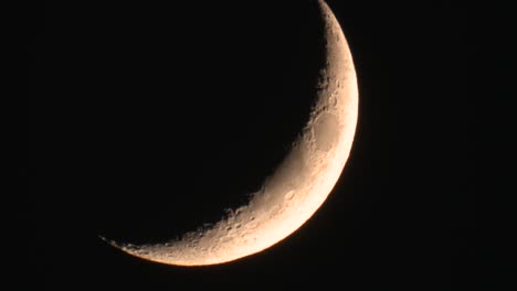 Crescent-moon-descending-through-fram