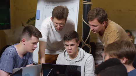 Men-Discussing-Task-at-Coding-Workshop