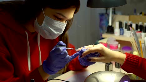 Woman-Making-Manicure-for-a-Client