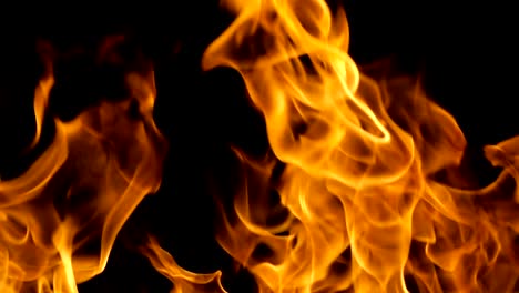 Flames-of-fire-on-black-background-in-slow-motion