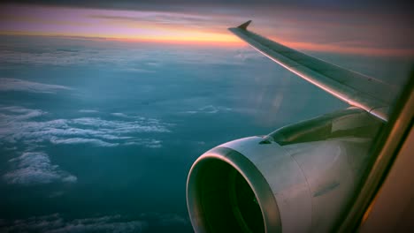 Wing-and-engine-of-airplane-flying-on-sky-and-cloud-on-beautiful-view