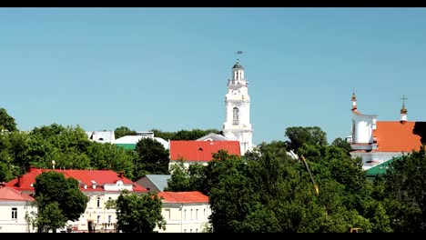 Vitebsk,-Belarus.-Town-Hall-And-Church-Of-Resurrection-Of-Christ-In-Sunny-Summer-Day.-Zoom,-Zoom-In