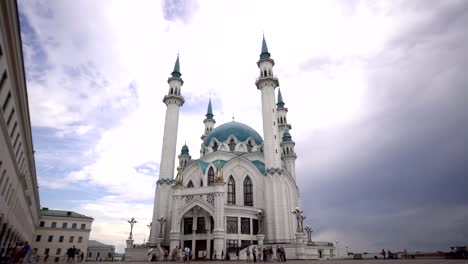 Beautiful-architecture.-The-majestic-white-temple-with-a-green-roof-stands-on-the-square-and-attracts-tourists.-The-effect-of-fast-shooting-of-the-temple-and-tourists