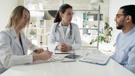 Female-Doctors-Talking-to-Colleague-or-Patient