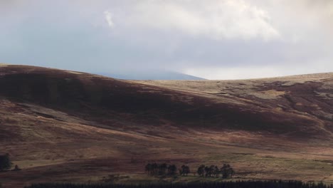 Scottish-mountain-scene-of-glen-during-stormy-weather-in-the-cairngorms-NP-during-October,-autumn.