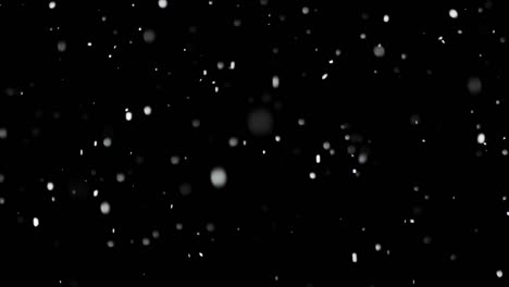 White-Snow-Falling-on-Isolated-Black-Background