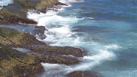 Foaming-and-splashing-wave-in-the-Ocean-with-slow-motion-style,-Sunny-Day-in-Chaojing-Park,-Keelung-City-Taiwan