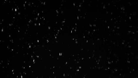 Falling-down-snow-on-black