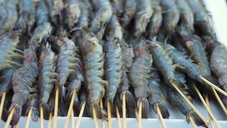 Raw-prawns-on-skewers-prepare-for-BBQ