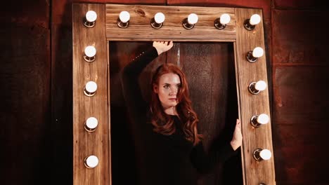 red-haired-beauty-posing-against-the-background-of-an-underground-wall