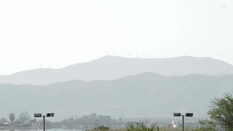 Passenger-airplane-taking-off-from-airport-at-sunset