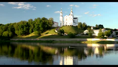 Vitebsk,-Belarus.-Assumption-Cathedral-Church,-Town-Hall,-Church-Of-Resurrection-Of-Christ-And-Dvina-River-In-Sunny-Summer-Day.-Pan,-Panorama