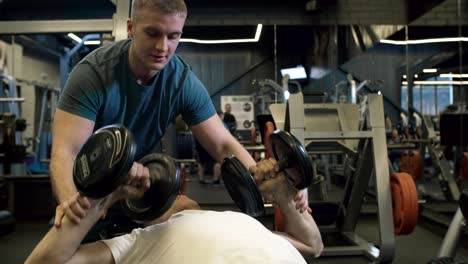 Man-Doing-Dumbbell-Bench-Press