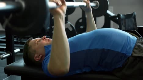 Man-Doing-Chest-Press-on-Bench