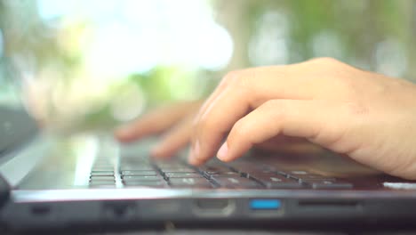 Woman-hand-using-laptop.